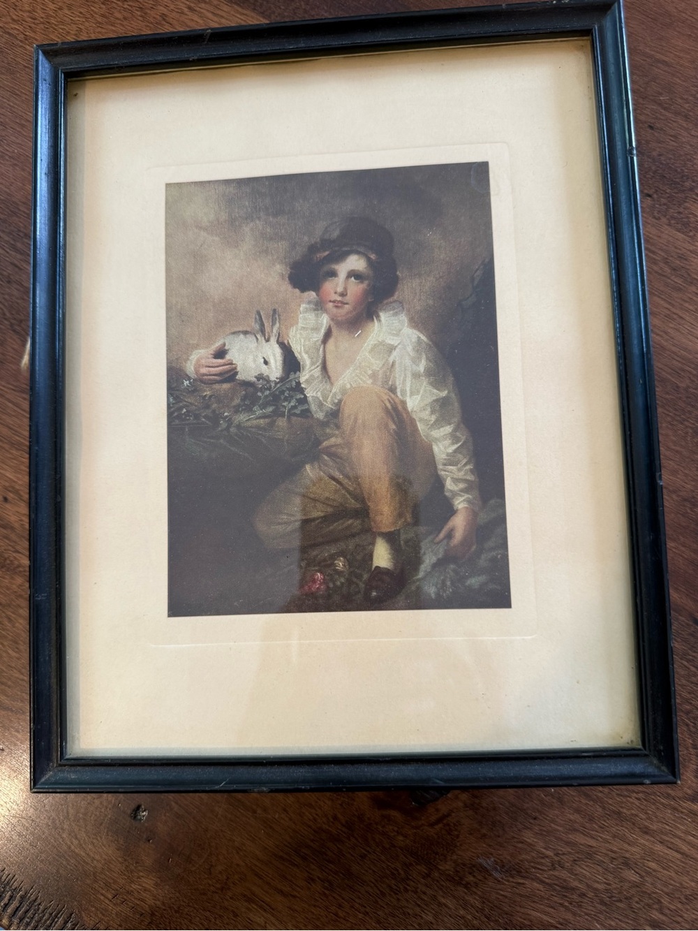 Framed Vintage Print of Boy with Rabbit - Black Frame